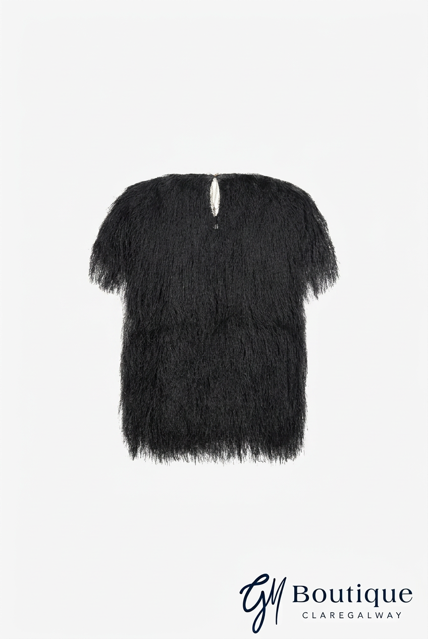 A black shaggy, feather-textured short-sleeve top with a keyhole cutout at the neckline, shown against a plain white background with a 'GM Boutique' watermark in the bottom right corner.
