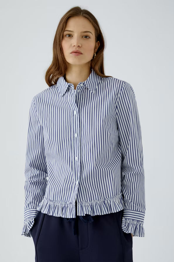 Striped blouse with attached ruffle on the sleeve and hem