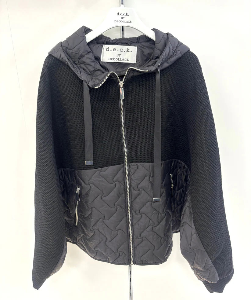 Black and gray quilted jacket on a hanger with 'd.e.c.k' label.