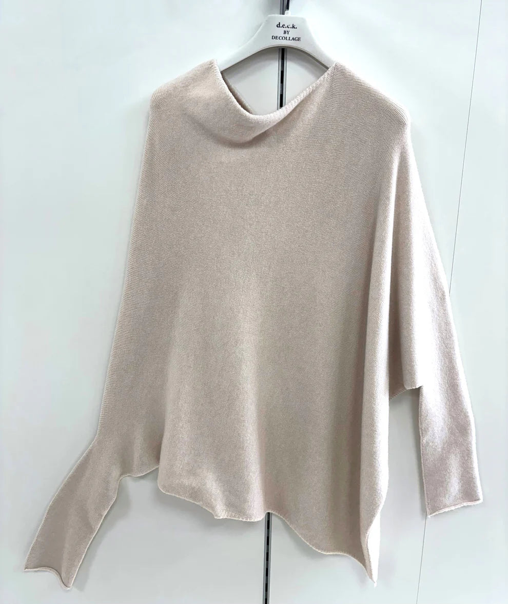 Beige sweater on a hanger against a white background