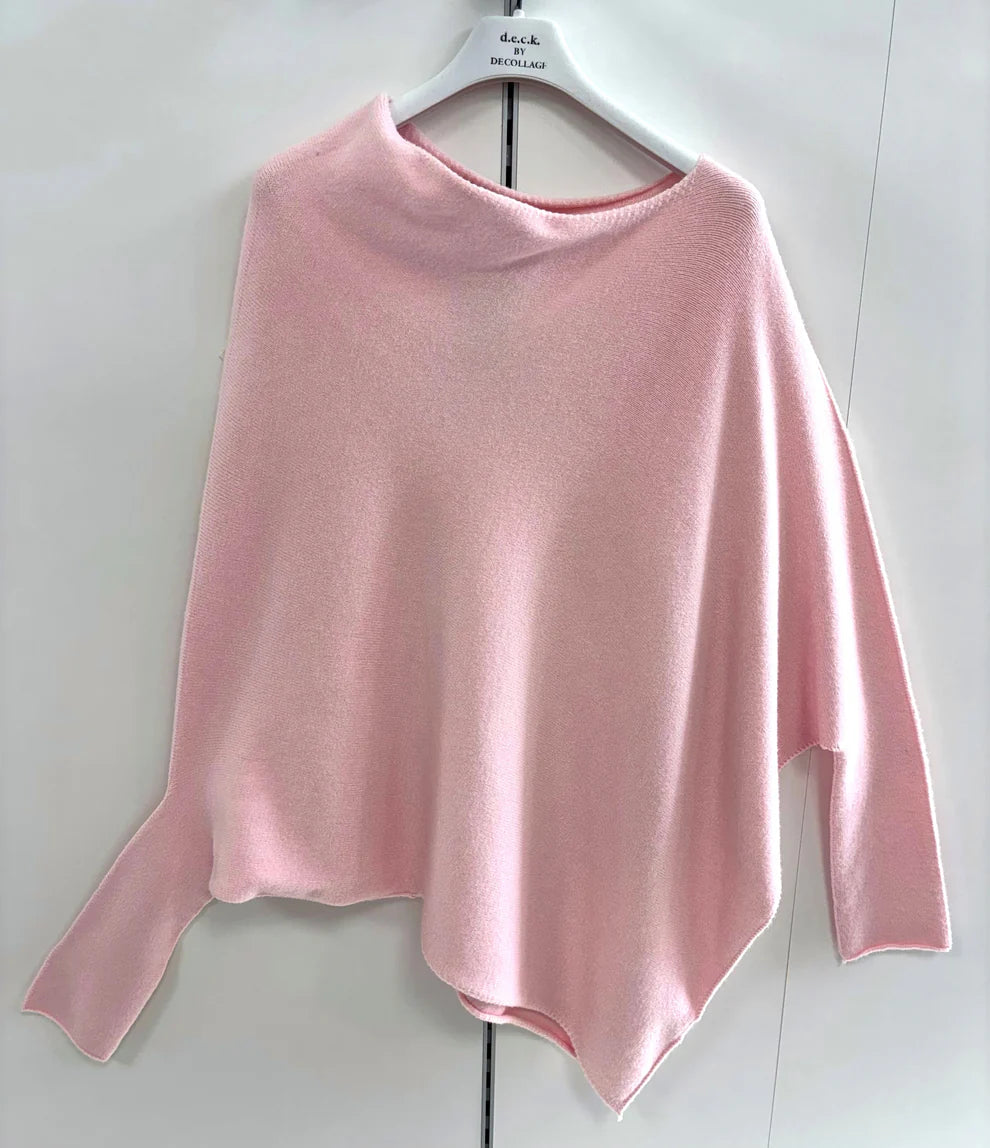 Pink sweater on a hanger against a white background