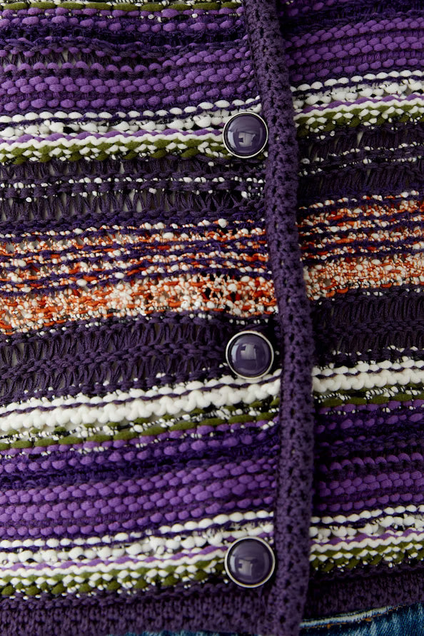 Cardigan made from 4 different yarns in inside out stripe pattern