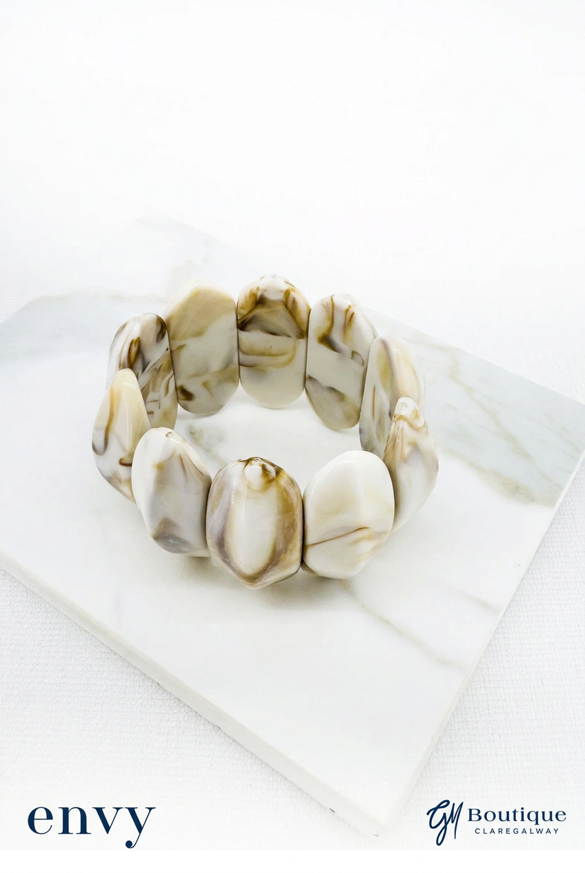 Envy Jewellery cream bracelet with glossy rounded marbled beads