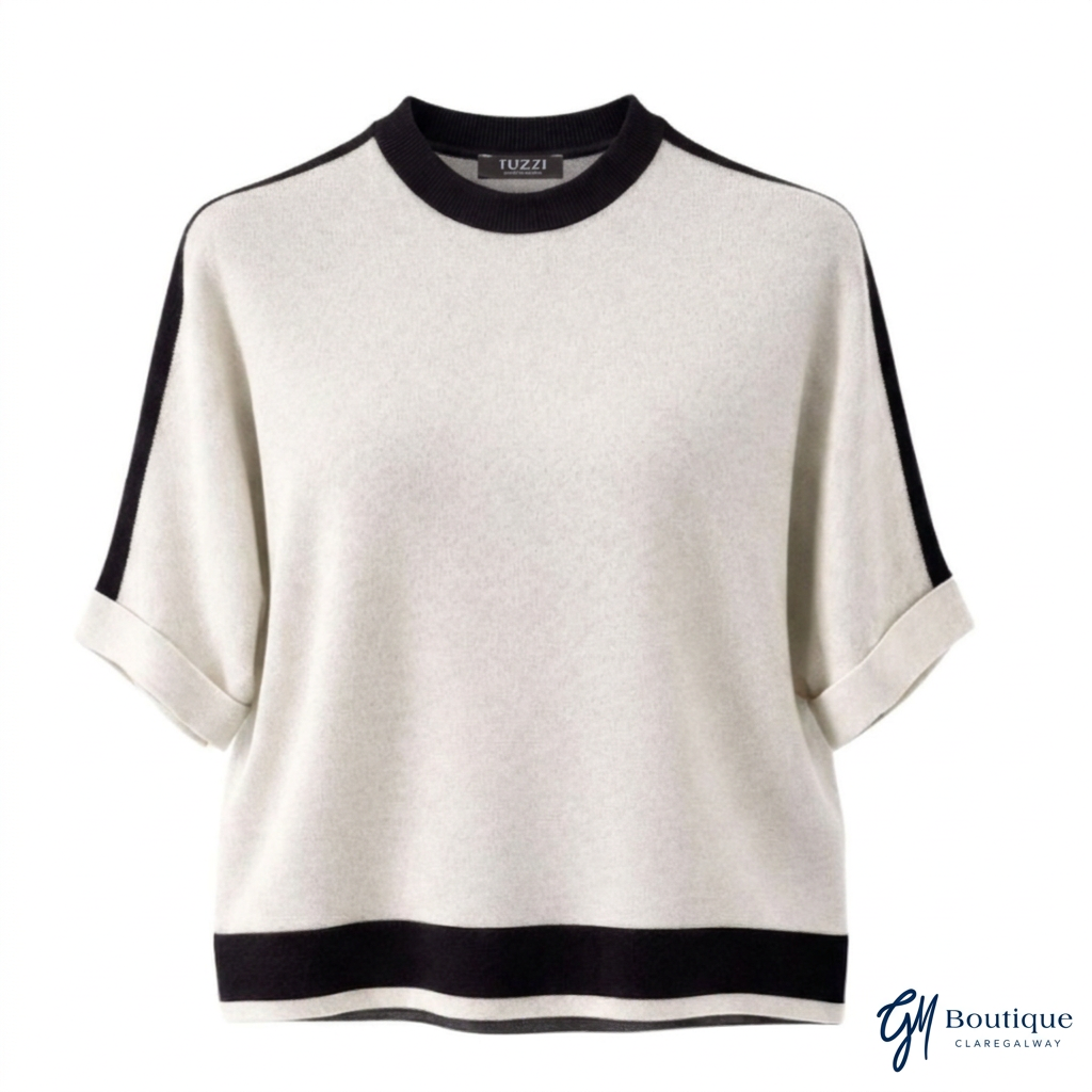 Front view of Tuzzi ivory short-sleeve pullover with black neckline, shoulder stripes and hem band.