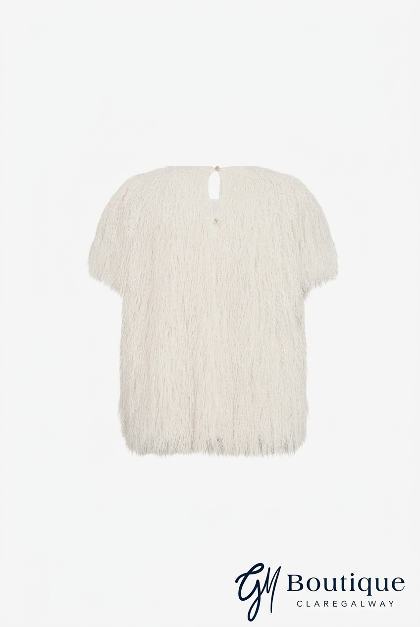 An off-white fringed short-sleeve top shown from the back on a plain white background, with a 'G1 Boutique' watermark at the bottom right.