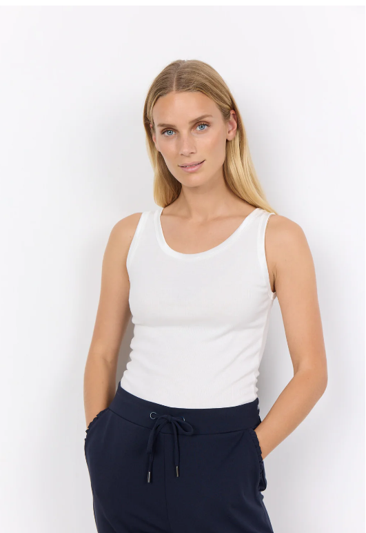 Woman wearing top on white background