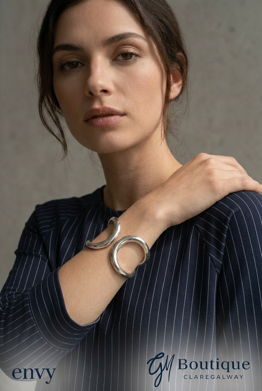  wearing the Via Appia navy pinstripe top with the Envy bracelet