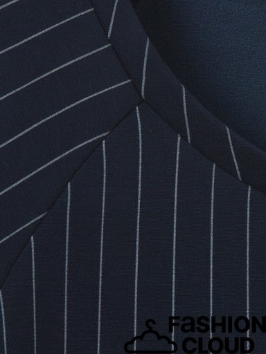 Close-up of a dark navy blue fabric with thin white vertical pinstripes and a curved collar seam, with a 'FASHION CLOUD' watermark at the bottom right.