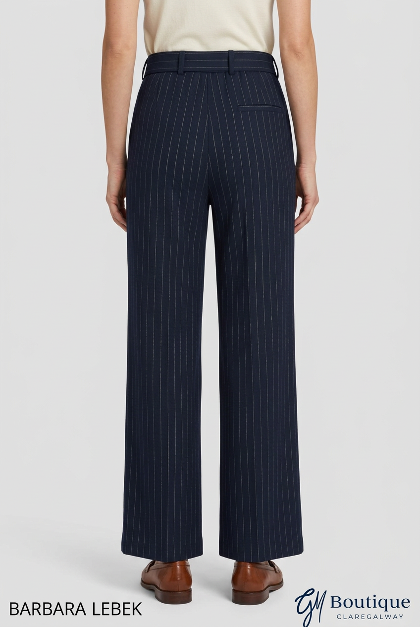 AI styling preview of Barbara Lebek navy pinstripe wide-leg trousers, rear view, with Barbara Lebek and GM Boutique logos