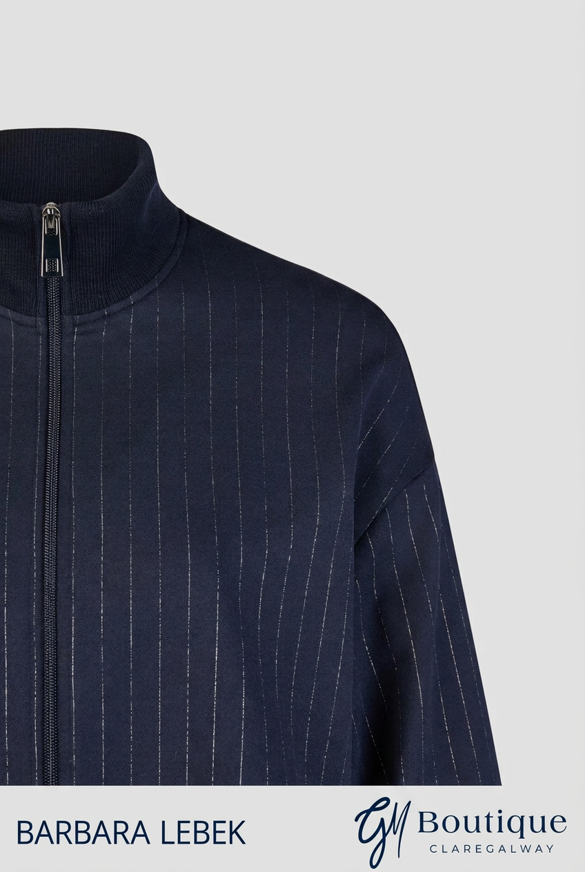 AI-edited detail preview of Barbara Lebek navy pinstripe jacket showing stand collar and front zip; Barbara Lebek and GM Boutique branding