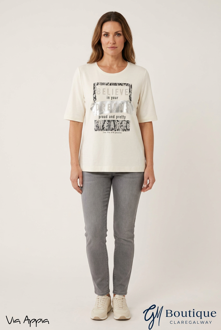AI styling preview of Via Appia cream graphic T-shirt on a model, front view, with Via Appia and GM Boutique logos