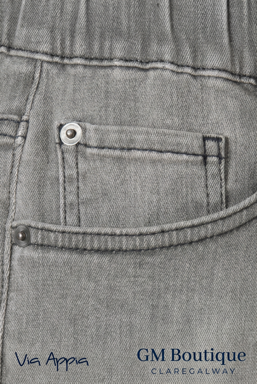 AI-edited detail preview of Via Appia grey denim waistband and pocket with both logos